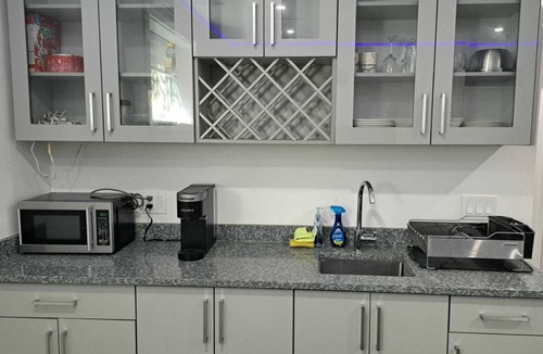 Delta House | One bed room Executive Suite with private entry and living Room and Kitchenet