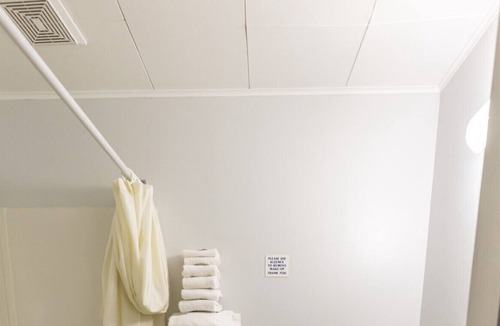 Creston House | Simple room with 2 queen beds, full bathroom.