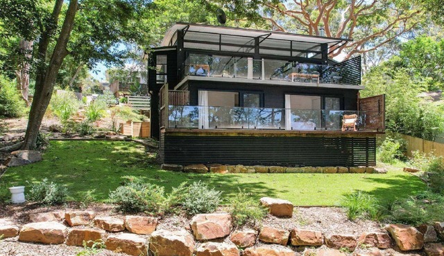 Elegant abode only moments to Macmasters Beach in MACMASTERS BEACH