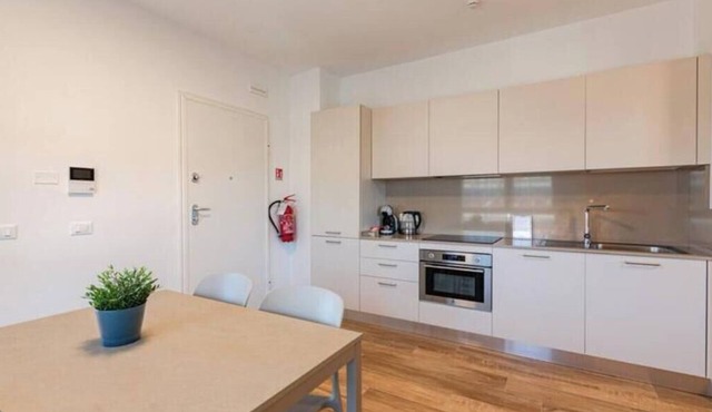 Tower View & Double Balcony - Modern Studio Apartment with Parking in Pisa