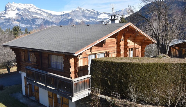 Typical Savoyard wooden chalet facing Mont Blanc in Saint Gervais